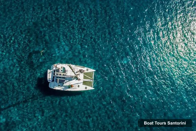 Boat Tours in Santorini – Private Catamaran Cruise with Food & Drinks